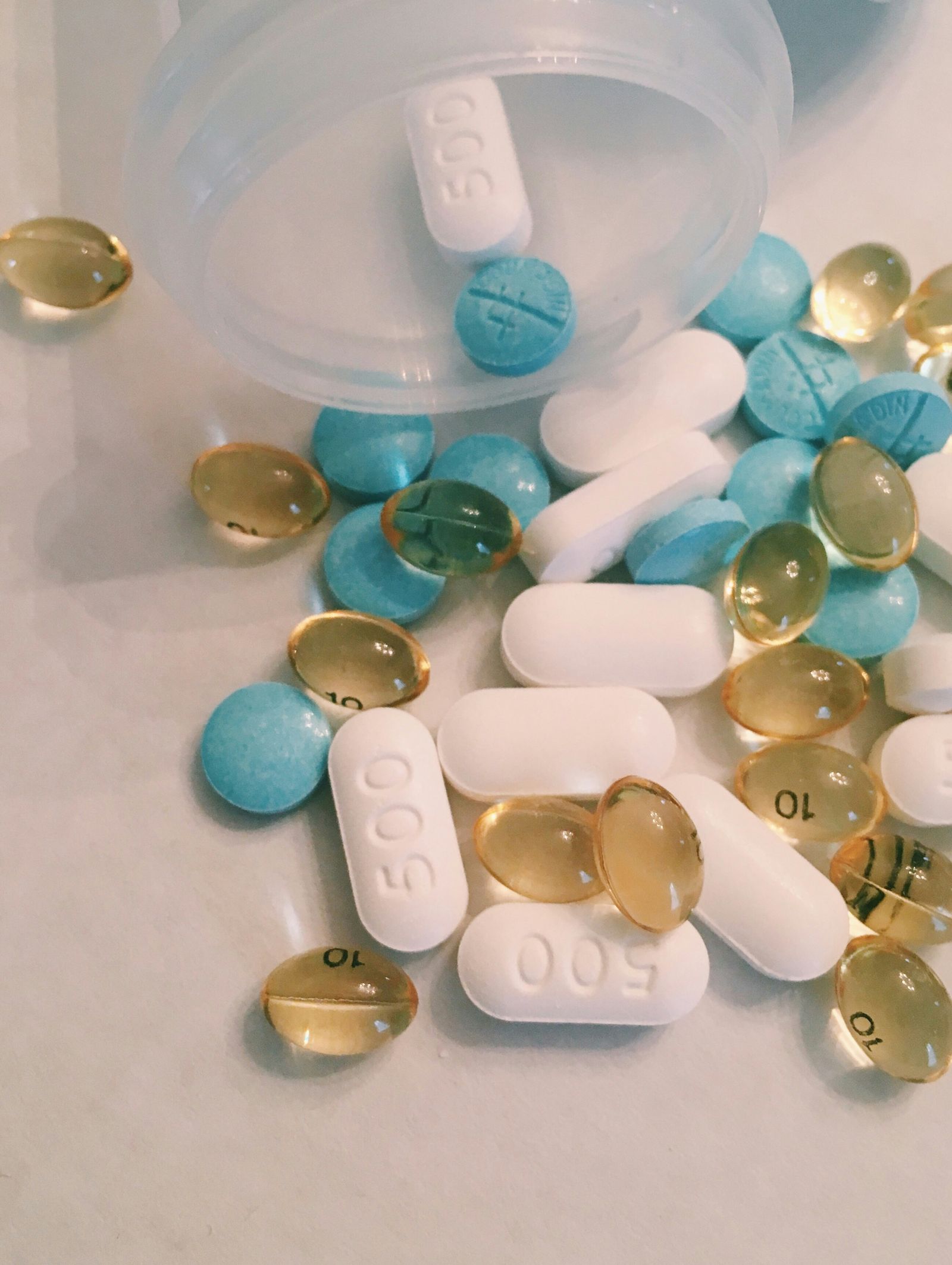 Assorted medication capsules and pills