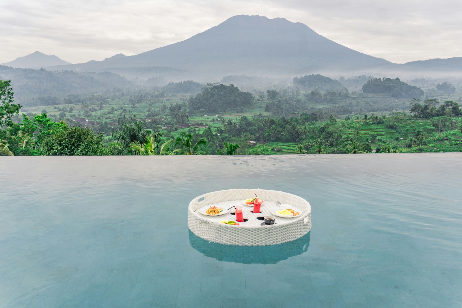 Floating breakfast served in a Bali villa pool