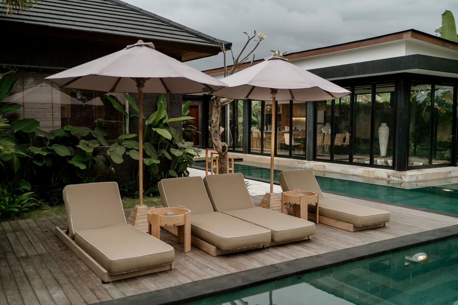 Pool lounge chairs at a private villa in Ubud